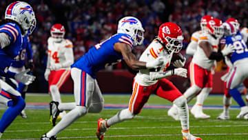 Kansas City Chiefs wide receiver Xavier Worthy runs with the ball against Buffalo Bills cornerback Rasul Douglas.