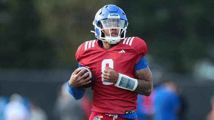 Kansas redshirt sophomore quarterback Isaiah Marshall (8) 