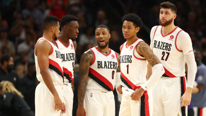 Nov 10, 2021; Phoenix, Arizona, USA; Portland Trail Blazers guard Damian Lillard (0) in the huddle with guard CJ McCollum (3) forward Nassir Little (9) guard Anfernee Simons (1) and center Jusuf Nurkic (27) against the Phoenix Suns at Footprint Center. Mandatory Credit: Mark J. Rebilas-USA TODAY Sports