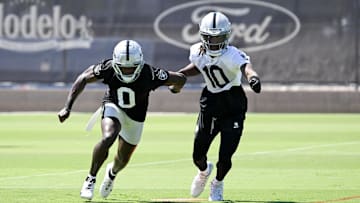 Jun 11, 2025; Henderson, NV, USA; Las Vegas Raiders cornerback Jakorian Bennett (0) and wide receiver Dont'e Thornton Jr. (10) run through a drill during Las Vegas Raiders Minicamp at Intermountain Health Performance Center. Mandatory Credit: Candice Ward-Imagn Images