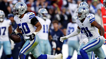 Former Dallas Cowboys linebacker Eric Kendricks (50) celebrates after recovering a fumble during the fourth quarter against the Washington Commanders at Northwest Stadium.