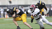 Oct 11, 2025; Columbia, Missouri, USA; Alabama Crimson Tide linebacker Yhonzae Pierre (42) goes after Missouri Tigers quarterback Beau Pribula (9) at Faurot Field at Memorial Stadium. Mandatory Credit: Reese Strickland-Imagn Images