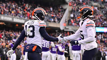 Nov 24, 2024; Chicago, Illinois, USA; Chicago Bears wide receiver Keenan Allen (13) celebrates his touchdown reception with wide receiver Rome Odunze (15) against the Minnesota Vikings during the fourth quarter at Soldier Field. Mandatory Credit: Daniel Bartel-Imagn Images