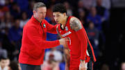 Jan 25, 2025; Gainesville, Florida, USA; Georgia Bulldogs head coach Mike White talks with Georgia Bulldogs guard Dakota Leffew (1) against the Florida Gators during the second half at Exactech Arena at the Stephen C. O'Connell Center. Mandatory Credit: Matt Pendleton-Imagn Images