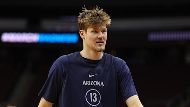 Arizona forward Henri Veesaar warms up during a practice session.