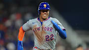 Mets right fielder Juan Soto runs toward third base in the third inning at loanDepot Park. 