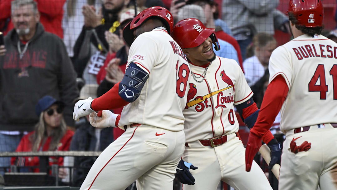 May 2, 2026; St. Louis, Missouri, USA; St. Louis Cardinals right fielder Jordan Walker (18) celebrates with St. Louis Cardinals shortstop Masyn Winn (0) after hitting a two-run home run against the Los Angeles Dodgers in the third inning at Busch Stadium. Mandatory Credit: Joe Puetz-Imagn Images