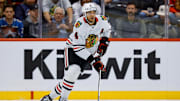 Oct 28, 2024; Denver, Colorado, USA; Chicago Blackhawks defenseman Seth Jones (4) controls the puck in the third period against the Colorado Avalanche at Ball Arena. Mandatory Credit: Isaiah J. Downing-Imagn Images