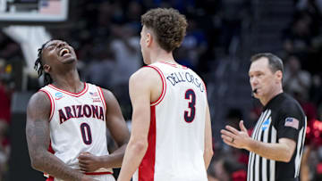 Mar 23, 2025; Seattle, WA, USA;  Arizona Wildcats guard Jaden Bradley (0) reacts with guard Anthony Dell'Orso (3) in the game against the Oregon Ducks in the second half at Climate Pledge Arena. Mandatory Credit: Stephen Brashear-Imagn Images