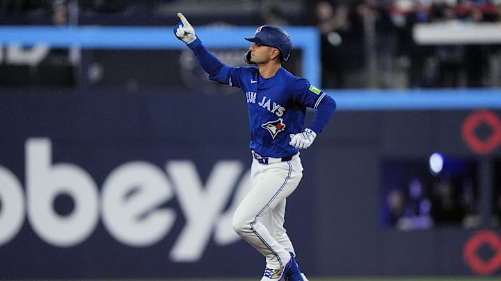 May 11, 2026; Toronto, Ontario, CAN; Toronto Blue Jays shortstop Andres Gimenez (0) celebrates as he rounds second base after hitting a two-run home run against the Tampa Bay Rays during the seventh inning at Rogers Centre. Mandatory Credit: John E. Sokolowski-Imagn Images