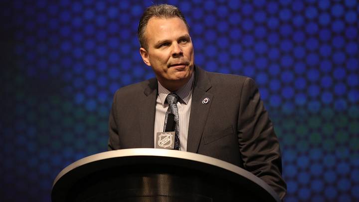 Jun 27, 2014; Philadelphia, PA, USA; Winnipeg Jets general manager Kevin Cheveldayoff announces Nikolaj Ehlers (not pictured) as the number nine overall pick to the Winnipeg Jets in the first round of the 2014 NHL Draft at Wells Fargo Center. Mandatory Credit: Bill Streicher-Imagn Images