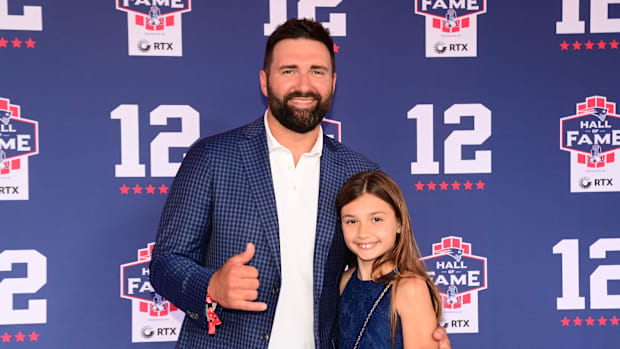 Former Patriots player Rob Ninkovich poses for a photo with his daughter Olivia at the New England Patriots Hall of Fame