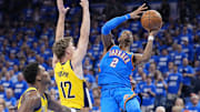Jun 8, 2025; Oklahoma City, Oklahoma, USA: Oklahoma City Thunder guard Shai Gilgeous-Alexander (2) shoots the ball against Indiana Pacers forward Johnny Furphy (12) during the second half during game two of the 2025 NBA Finals at Paycom Center. Mandatory Credit: Kyle Terada-Imagn Images