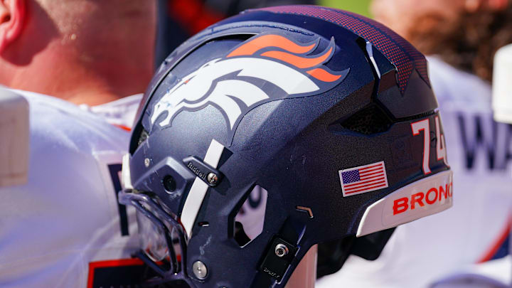 A general view of a Denver Broncos helmet against the Kansas City Chiefs at GEHA Field at Arrowhead Stadium. A general view of a Denver Broncos helmet against the Kansas City Chiefs at GEHA Field at Arrowhead Stadium.