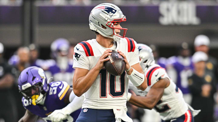 Aug 16, 2025; Minneapolis, Minnesota, USA;  New England Patriots quarterback Drake Maye (10) throws a pass against the Minnesota Vikings during the first quarter at U.S. Bank Stadium. Mandatory Credit: Jeffrey Becker-Imagn Images