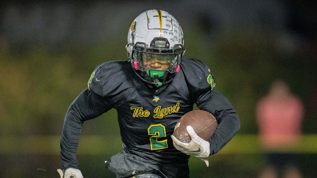 Northland's Amir Brown (2) runs the ball down the field during their game against Big Walnut at Northland High School. Northland's Amir Brown (2) runs the ball down the field during their game against Big Walnut at Northland High School.