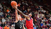 Feb 5, 2025; Blacksburg, Va.; SMU guard B.J. Edwards (0) shoots the ball as Virginia Tech guard Jaden Schutt (2) defends.