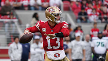 Nov 17, 2024; Santa Clara, California, USA; San Francisco 49ers quarterback Brock Purdy (13) throws a pass against the Seattle Seahawks in the second quarter at Levi's Stadium. Mandatory Credit: David Gonzales-Imagn Images