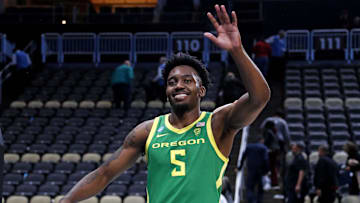 Mar 21, 2024; Pittsburgh, PA, USA; Oregon Ducks guard Jermaine Couisnard (5) waves as he walks off the court after the Oregon Ducks beat the South Carolina Gamecocks in the first round of the 2024 NCAA Tournament at PPG Paints Arena. Mandatory Credit: Charles LeClaire-USA TODAY Sports