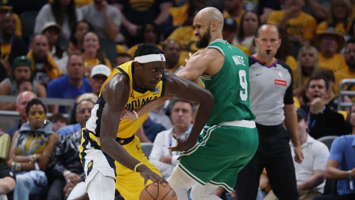 May 25, 2024; Indianapolis, Indiana, USA; Indiana Pacers forward Pascal Siakam (43) drives against Boston Celtics guard Derrick White (9) during the third quarter of game three of the eastern conference finals in the 2024 NBA playoffs at Gainbridge Fieldhouse. Mandatory Credit: Trevor Ruszkowski-USA TODAY Sports