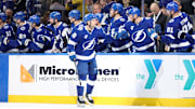 Feb 6, 2025; Tampa, Florida, USA; Tampa Bay Lightning left wing Brandon Hagel (38) is congratulated after scoring against the Ottawa Senators during the second period at Amalie Arena. Mandatory Credit: Kim Klement Neitzel-Imagn Images