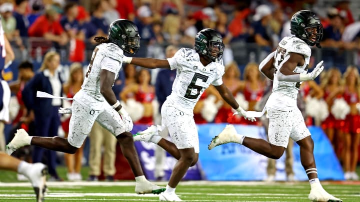 Oct 8, 2022; Tucson, Arizona, USA; Oregon Ducks defensive back Jahlil Florence (6) celebrates an interception during the second half against the Arizona Wildcats at Arizona Stadium. Mandatory Credit: Mark J. Rebilas-USA TODAY Sports