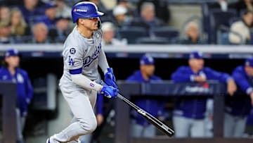 Oct 28, 2024; New York, New York, USA; Los Angeles Dodgers third baseman Enrique Hernandez (8) hits a an RBI single during the sixth inning against the New York Yankees in game three of the 2024 MLB World Series at Yankee Stadium. Mandatory Credit: Brad Penner-Imagn Images