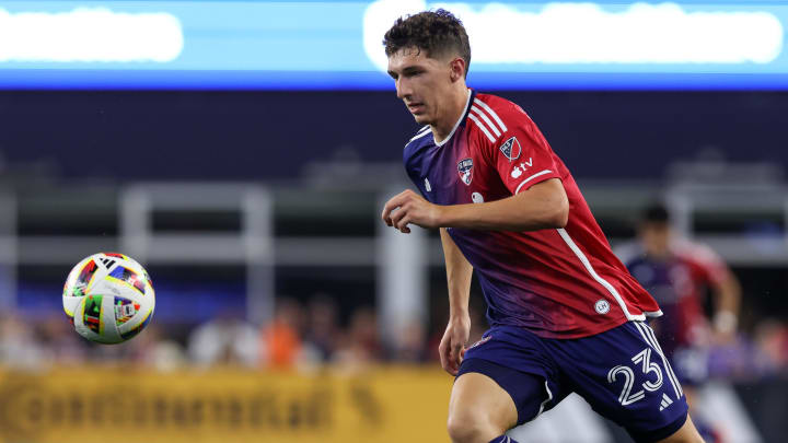 Jul 20, 2024; Foxborough, Massachusetts, USA; FC Dallas forward Logan Farrington (23) possesses the ball during the second half against the New England Revolution at Gillette Stadium. Mandatory Credit: Paul Rutherford-USA TODAY Sports