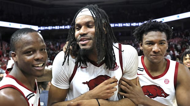 Jonas Aidoo (middle) enjoyed the post-game celebration with Nelly Davis (left) and Karter Knox after netting the game-winning
