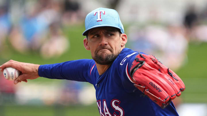 Mar 23, 2024; Surprise, Arizona, USA; Texas Rangers starting pitcher Nathan Eovaldi (17) pitches against the Kansas City Royals during the first inning at Surprise Stadium. Mandatory Credit: Joe Camporeale-Imagn Images