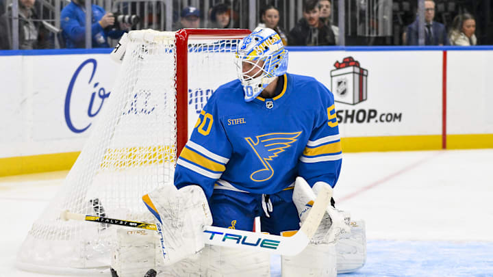 Dec 1, 2025; St. Louis, Missouri, USA; St. Louis Blues goaltender Jordan Binnington (50) defends the net against the Anaheim Ducks during the first period at Enterprise Center. Mandatory Credit: Jeff Curry-Imagn Images