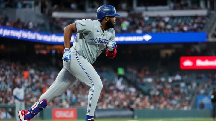 Jul 10, 2024; San Francisco, California, USA; Toronto Blue Jays first base Vladimir Guerrero Jr. (27) hits a double during the sixth inning against the San Francisco Giants at Oracle Park. Mandatory Credit: Sergio Estrada-USA TODAY Sports