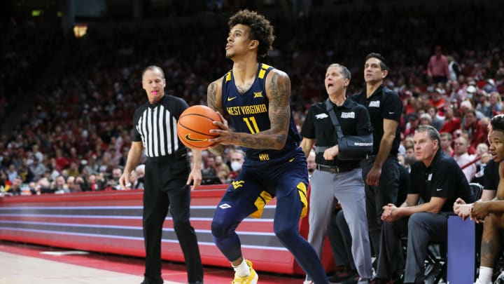 Jan 29, 2022; Fayetteville, Arkansas, USA; West Virginia Mountaineers forward Jalen Bridges (11)