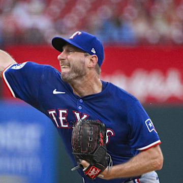 Jul 30, 2024; St. Louis, Missouri, USA;  Texas Rangers starting pitcher Max Scherzer (31) pitches against the St. Louis Cardinals during the second inning at Busch Stadium. 