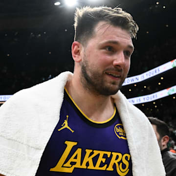 Mar 8, 2025; Boston, Massachusetts, USA; Los Angeles Lakers guard Luka Doncic (77) walks off of the court after a game against the Boston Celtics at the TD Garden. Mandatory Credit: Brian Fluharty-Imagn Images