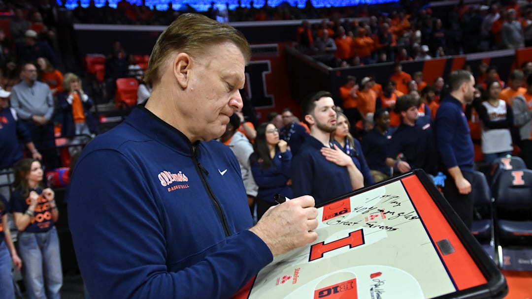 Illinois Fighting Illini head coach Brad Underwood works on his game plan before the first half against the Oregon Ducks at State Farm Center on March 3, 2026.