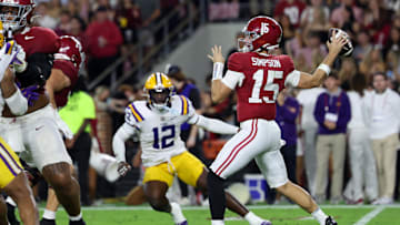 Nov 8, 2025; Tuscaloosa, Alabama, USA; Alabama Crimson Tide quarterback Ty Simpson (15) passes the ball against the Louisiana State Tigers during the first quarter of the game at Saban Field at Bryant-Denny Stadium. Mandatory Credit: David Leong-Imagn Images