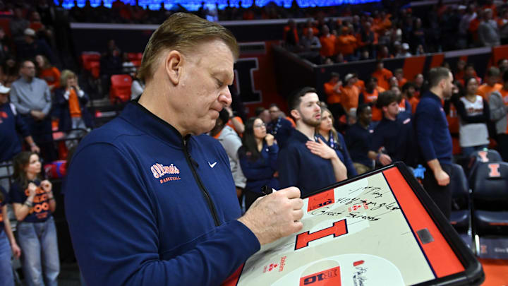 Illinois Fighting Illini head coach Brad Underwood works on his game plan before the first half against the Oregon Ducks at State Farm Center on March 3, 2026.