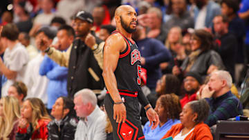 Dec 26, 2024; Atlanta, Georgia, USA; Chicago Bulls guard Jevon Carter (5) looks to the scoreboard against the Atlanta Hawks in the fourth quarter at State Farm Arena. Mandatory Credit: Brett Davis-Imagn Images