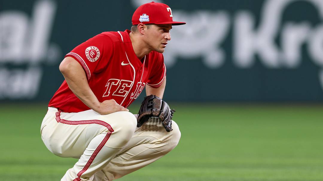 Jun 5, 2026; Arlington, Texas, USA; Texas Rangers shortstop Corey Seager (5) stretches during a break in the eighth inning against the Cleveland Guardians at Globe Life Field. Mandatory Credit: Andrew Dieb-Imagn Images