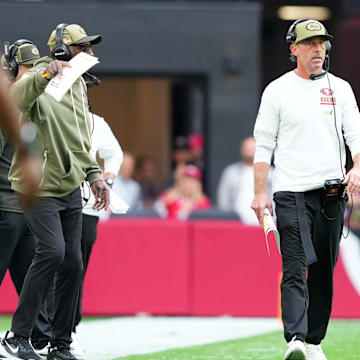 Nov 16, 2025; Glendale, Arizona, USA; San Francisco 49ers head coach Kyle Shanahan looks on during the first half against the Arizona Cardinals at State Farm Stadium. Mandatory Credit: Joe Camporeale-Imagn Images