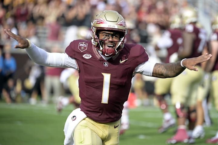 Florida State Seminoles quarterback Tommy Castellanos celebrates after a touchdown against the Alabama Crimson Tide. 