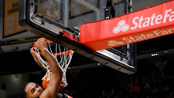 Feb 11, 2025; Nashville, Tennessee, USA; Auburn Tigers forward Johni Broome (4) dunks the ball against the Vanderbilt Commodores during the second half at Memorial Gymnasium. Mandatory Credit: Steve Roberts-Imagn Images