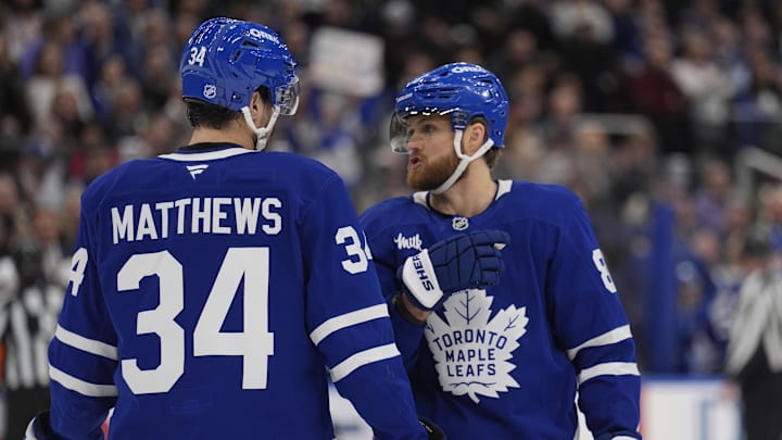 Dec 8, 2025; Toronto, Ontario, CAN; Toronto Maple Leafs forward William Nylander (88) and forward Auston Matthews (34) discuss a play against the Tampa Bay Lightning during the first period at Scotiabank Arena. Mandatory Credit: John E. Sokolowski-Imagn Images