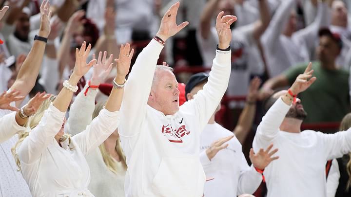 Nov 29, 2023; Fayetteville, Arkansas, USA; Arkansas Razorbacks athletic director Hunter Yurachek calls the hogs during the seance half against the Duke Blue Devils at Bud Walton Arena. Arkansas won 80-75. Mandatory Credit: Nelson Chenault-Imagn Images