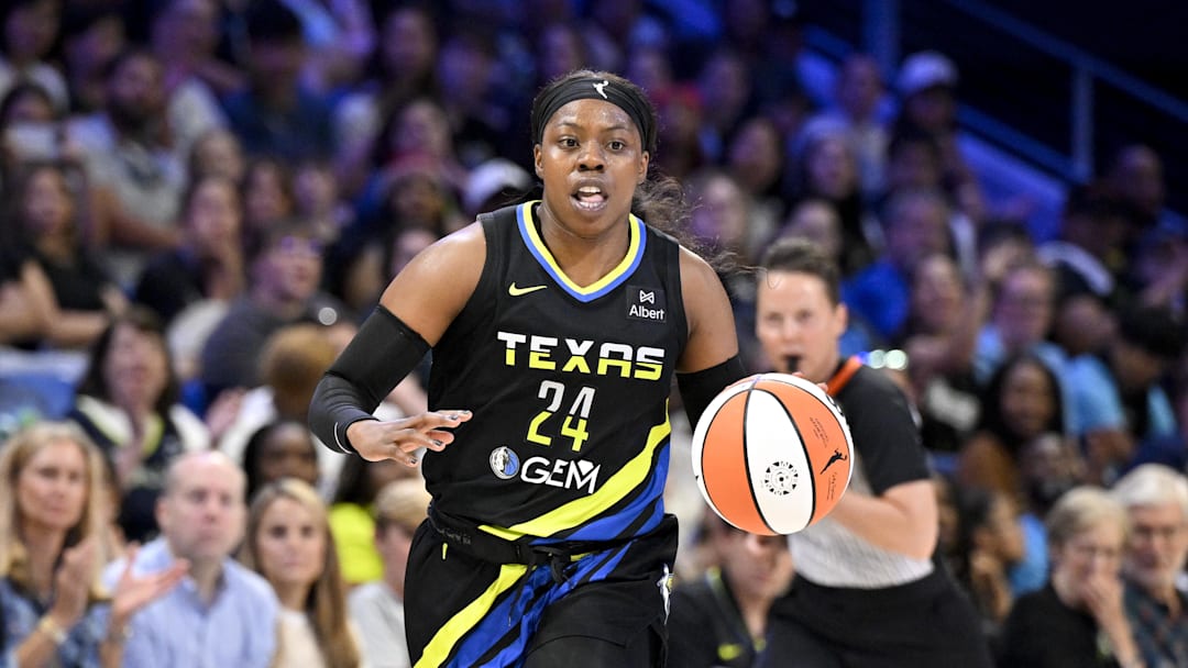 Jun 28, 2025; Arlington, Texas, USA; Dallas Wings guard Arike Ogunbowale (24) brings the ball up court against the Washington Mystics during the second half at College Park Center. Mandatory Credit: Jerome Miron-Imagn Images