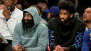 Oct 3, 2022; Brooklyn, New York, USA; Philadelphia 76ers guard James Harden (left) and Philadelphia 76ers center Joel Embiid watch from the bench during the second quarter against the Brooklyn Nets at Barclays Center. Mandatory Credit: Brad Penner-Imagn Images