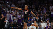 Dec 6, 2025; Phoenix, Arizona, USA; Oklahoma State Cowboys guard Christian Coleman (4) celebrates after making a 3-point shot against the Grand Canyon University Antelopes at PHX Arena. Mandatory Credit: Anna Carrington-Imagn Images