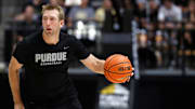 Robbie Hummel drives to the basket during the alumni game