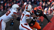 Bengals Joseph Ossai eyes the Browns quarterback during their game against the Browns at Paycor Stadium on Sunday December 22, 2024. Bengals lead the game at halftime with a score of 17-0.